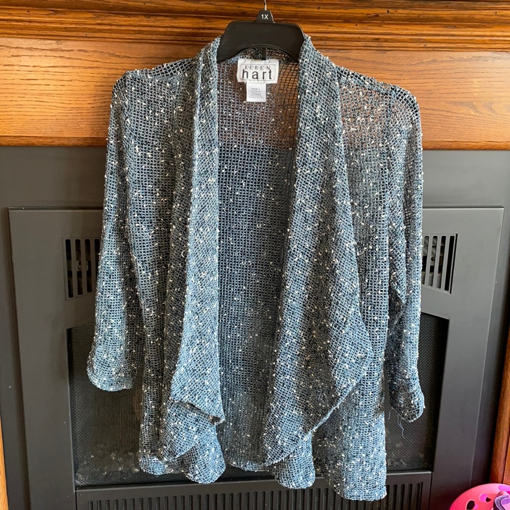 Ladies Large sweater.  Blue with white accents.